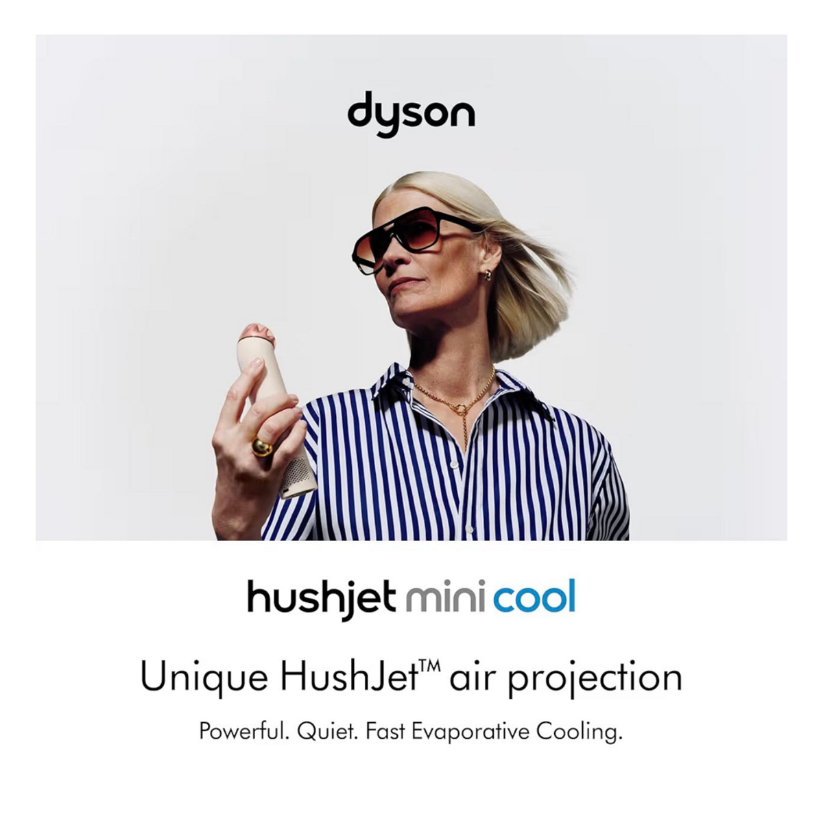 Woman using Dyson HushJet Mini Cool fan in Stone Blush